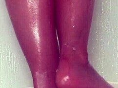 Nylon feet tease wet in steamy shower play