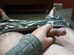 Mature dude strokes his thick cock super fast.