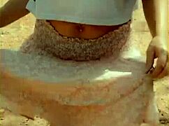 wifey lifts shirt flashing her bare milf tits outdoors