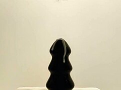 latexi69 slips buttplug deep into her latex-clad ass for intense anal play session