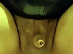 latexi69 slips buttplug deep into her latex-clad ass for intense anal play session