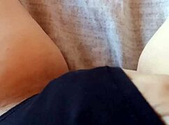 gretala slips into black lingerie showing her hairy bush