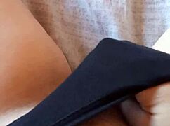 gretala slips into black lingerie showing her hairy bush