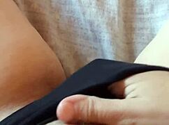 gretala slips into black lingerie showing her hairy bush