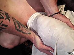 i'm hogtied choking on cock in one leg suspension pain