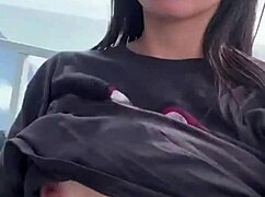 Exhibitionist wife flashes outdoors in solo display