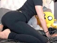 leggings stretched tight over her farting ass cheeks