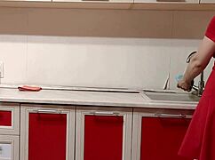 hey watch this milf housewife tease her wet pussy with dirty socks in kitchen