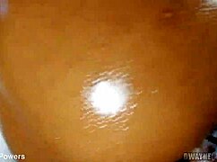 POV captures oiled ebony ass bent over for close monster BBC doggystyle thrusting