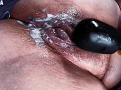 Insatiable Huge Hairy Pussy Squirts with Dildo Close-Up!