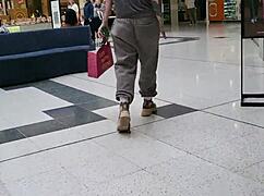 Trashy kiwi milf slut flashes pierced pussy outdoors mall street.