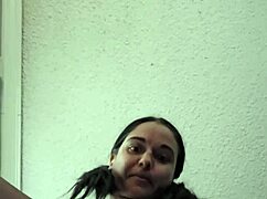 emy angel caresses her petite chatte on web chat