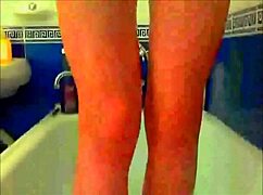 hey check this tattooed model fingering her pussy with glass dildo