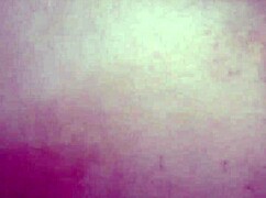 Mother-in-law bends over back bench outdoors