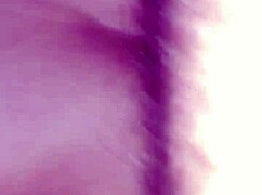 Mother-in-law bends over back bench outdoors