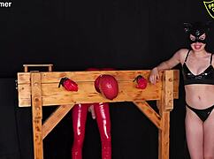 Slave Bound in Pillory for Degrading Garage Humiliation Exposure