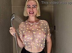Wow, beauty's huge tits drench in shower see-through top!