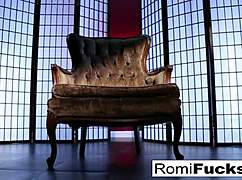 romi rain slides a dildo deep into her body during solo session with big tits on display