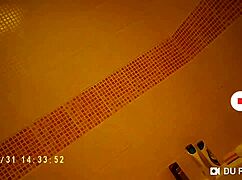 spy cam catches her showering nude with wet tits bouncing