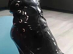 veve pops balloons sharp-style in shiny latex stockings hugging her big tits