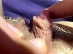 closeup view of her big clit pulsing through intense orgasm waves