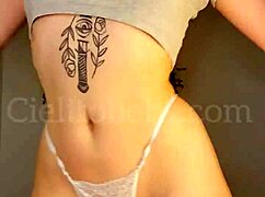 Argentinian babe dances in white microtanga flashing open ass trailer