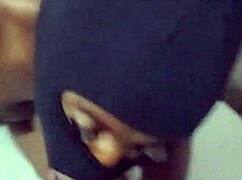 Young babe gulps entire chocolate cock deep down throat