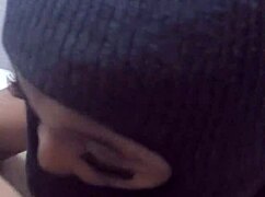 Young babe gulps entire chocolate cock deep down throat