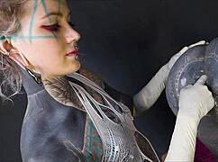 hey tranny take this tattooed domme's fist up your gaping ass now