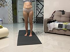 Angie Elif plays her pussy after yoga session.