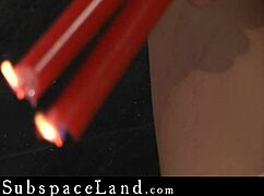 scarlet the slave sucks cock hard while bound spanked in bdsm dungeon