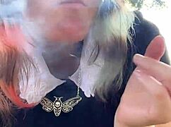 Alt girl next door milf smokes a cigarette out back casually