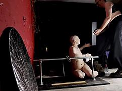 BEHIND THE SCENES ERYN'S FIRST TIME BOUND ON ONE BAR PRISON WITH DILDOS