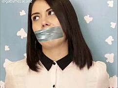 Sexy latina Gaby Meza bound as Wonder Woman in MrX BDSM bondage gag and tit torment