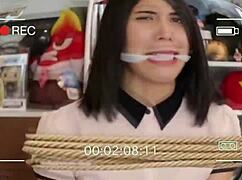 Sexy latina Gaby Meza bound as Wonder Woman in MrX BDSM bondage gag and tit torment