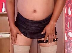 she dances sexy in her pink shiny thong and nylons