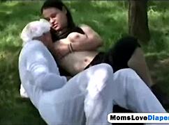 Milf Erica Venus Lactates While Strap-On Fucking Diapered Guy's Ass Outdoors!