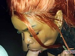 Tattooed stud pounds ebony redhead in dark forest