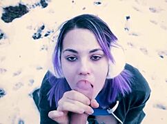 she kneels for that public blowjob right in the snowy city park