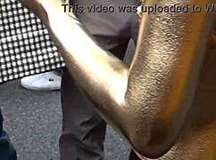 costume slips exposing hard nipples in intense osu gold powder nude show