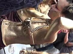 costume slips exposing hard nipples in intense osu gold powder nude show