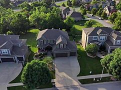 Curvy blonde milf Wendy Raine rides junior's monster cock cowgirl until cum blasts her big tits