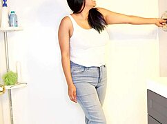 Latina soaks her jeans and panties then strips for a messy wet shower with big tits