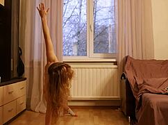 i stretch my nude body in acrobatic yoga poses showing flexible gymnast skills