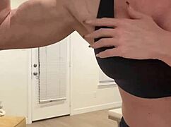 this muscular milf housewife flexes big tits for fitness fans