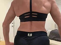 this muscular milf housewife flexes big tits for fitness fans
