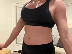 this muscular milf housewife flexes big tits for fitness fans
