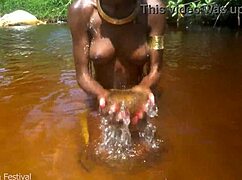 skinny tribe slut shows off her tits at the beach