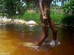 skinny tribe slut shows off her tits at the beach