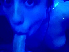 a girl gets her face roughly fucked in a crowded nightclub after teasing